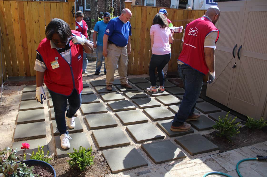 Backyard and patio makeover installing pavers